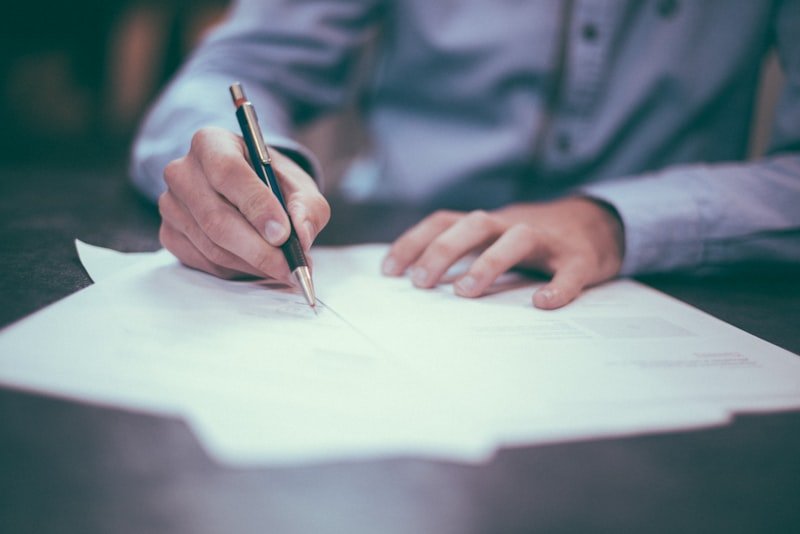 Business professional reviewing insurance documents